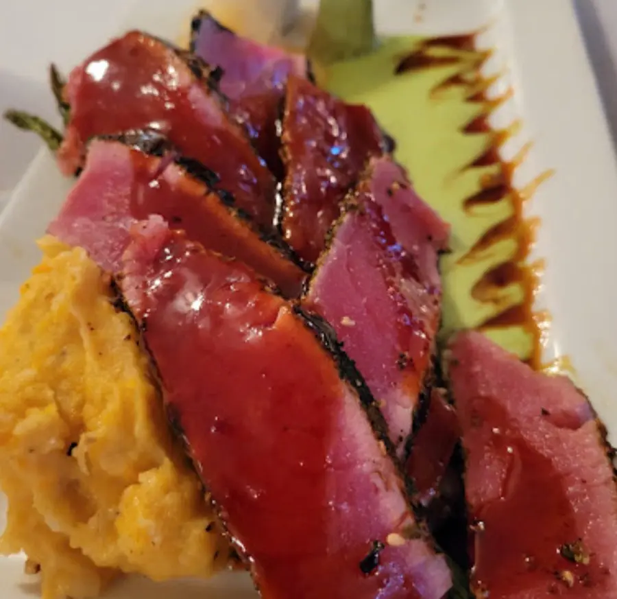 Seared rare ahi tuna over sweet potato mash
