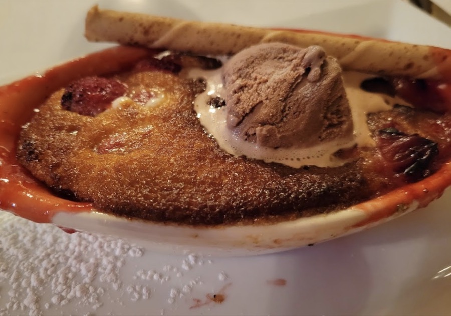 Warm fruit cobbler with chocolate ice cream