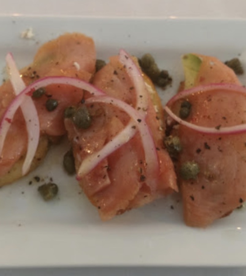 Pesto flatbread with cured meats and shaved parmesan
